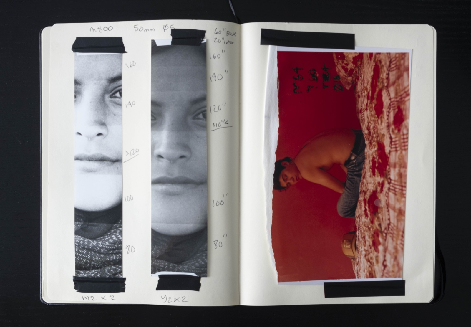 Working prints and portrait test strips in an RA-4 darkroom notebook